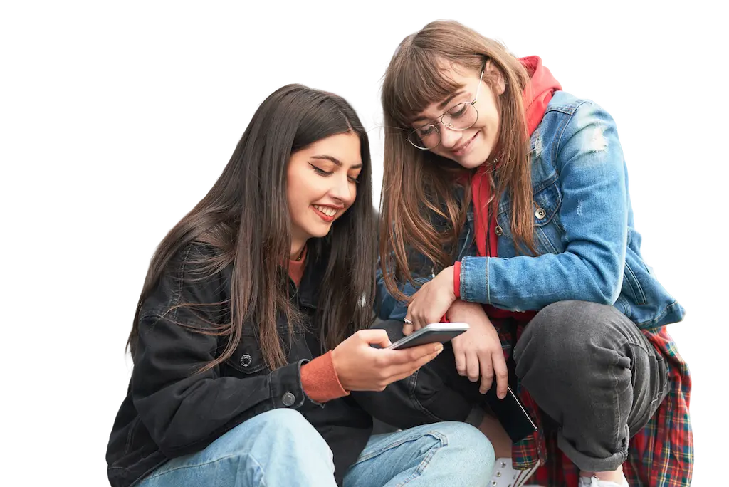 Two young women looking at mobile phone